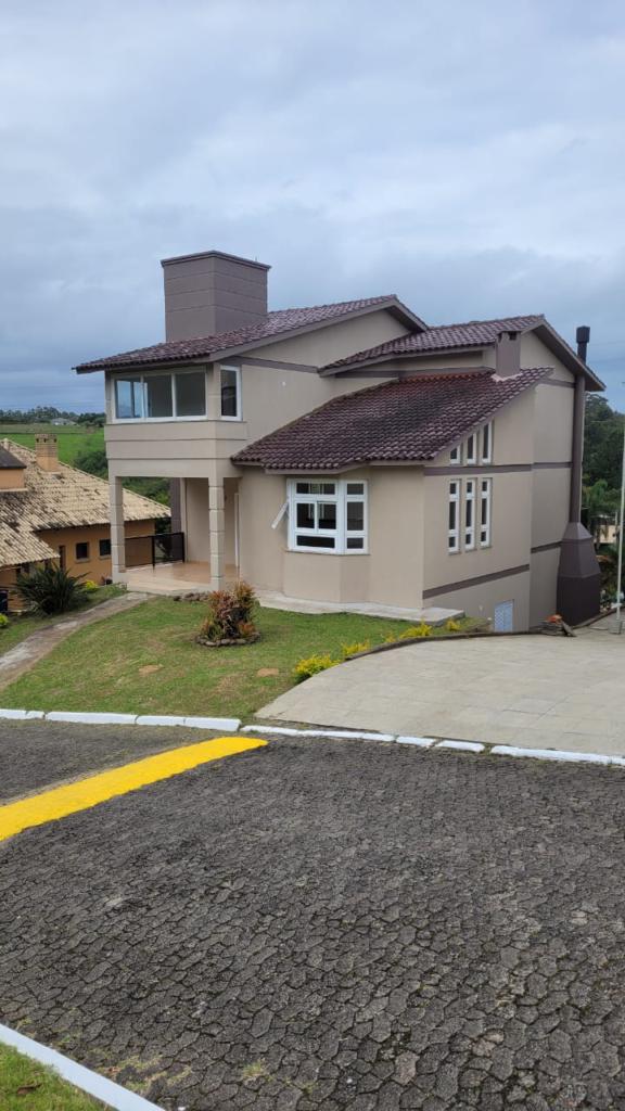 Casa de condomínio 5 dormitórios