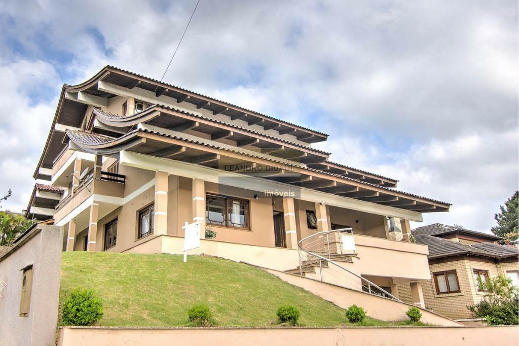 Casa de condomínio 4 dormitórios