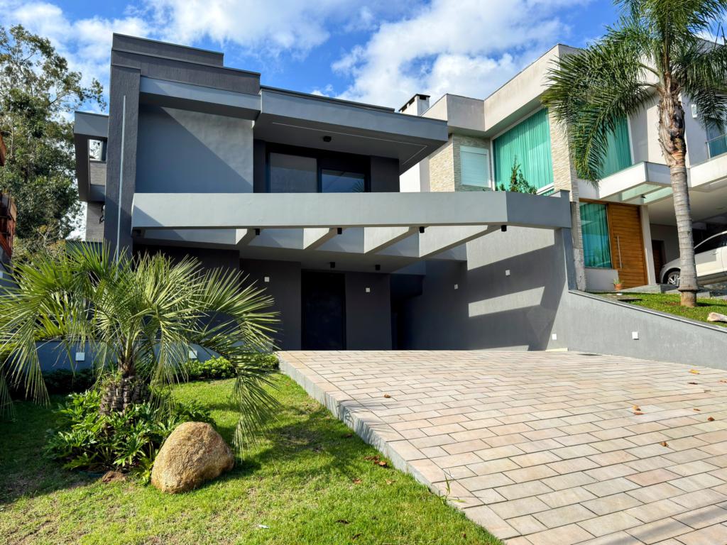 Casa de condomínio 4 dormitórios